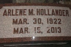 Photo of memorial burial with hand carved lettering