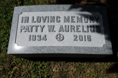 Photo of memorial grave marker with hand carved lettering