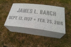 Photo of memorial grave marker with hand carved lettering