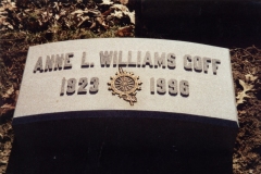 Photo of memorial grave marker with hand carved lettering