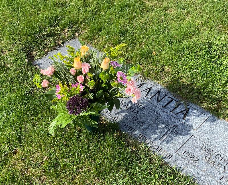 photos of flowers at a cemetery.