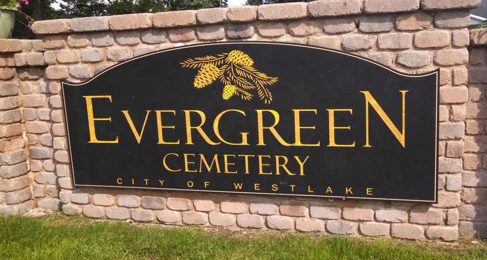 photo of brick and bronze entry sign to Evergreen Cemetery in Westlake Ohio